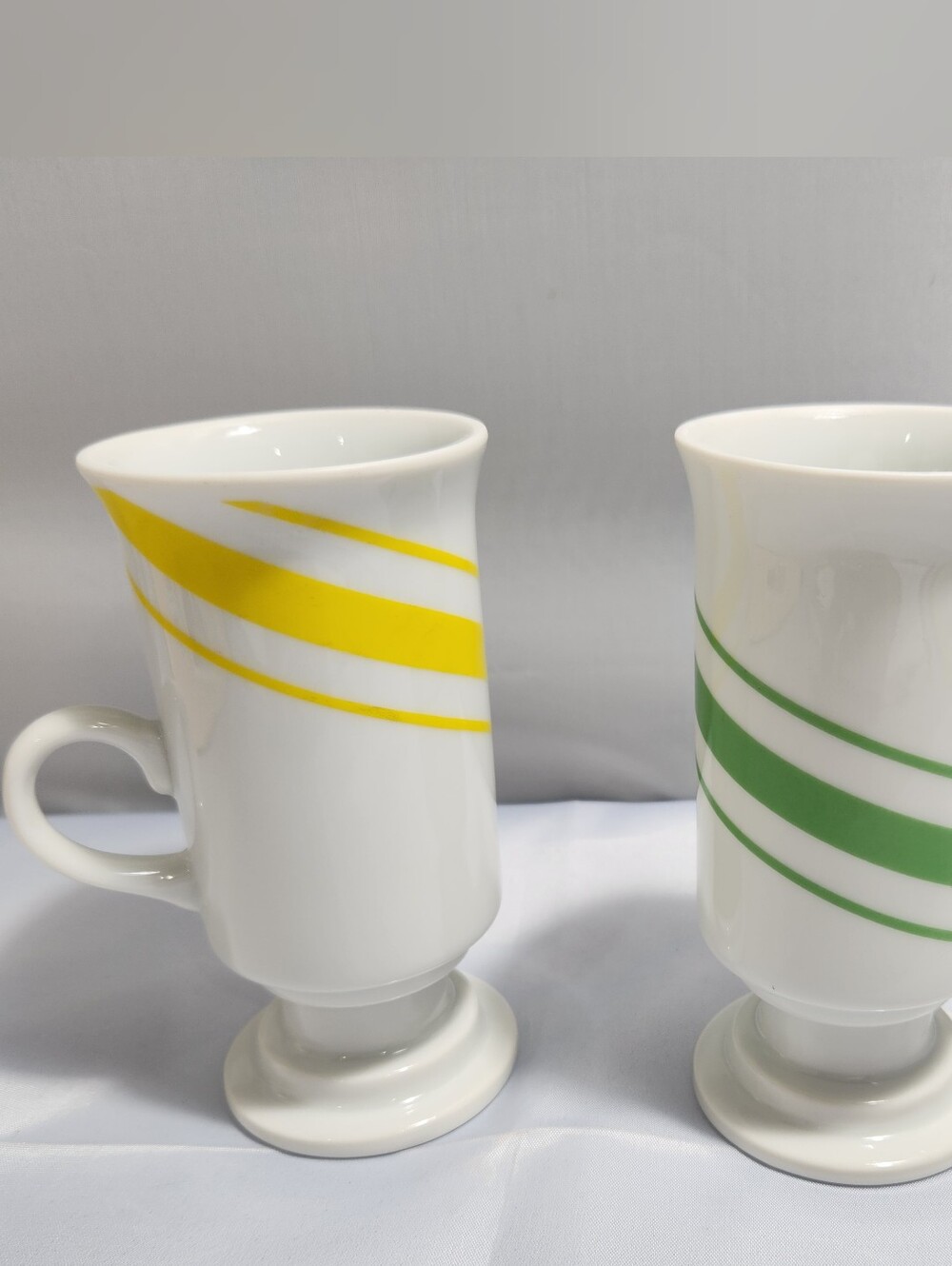 White Ceramic Pedestal Mugs with Yellow and Green Stripes - Set of 2
